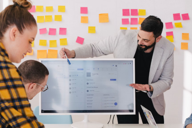 the team at Making You Content discussing tips on maintaining brand authenticity